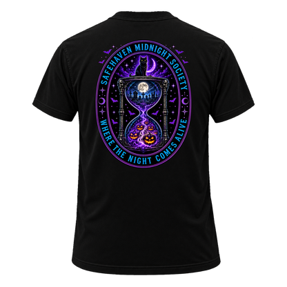 Back of the black SafeHaven Midnight Society tee — a large oval medallion in blue and purple neon, reading SAFEHAVEN MIDNIGHT SOCIETY around the top and WHERE THE NIGHT COMES ALIVE around the bottom. Inside, a black cat sits on an hourglass beneath a crescent moon; the upper bulb holds a moonlit graveyard and the lower one glowing jack-o-lanterns, with skulls on the hourglass posts and bats and moon phases around the border.